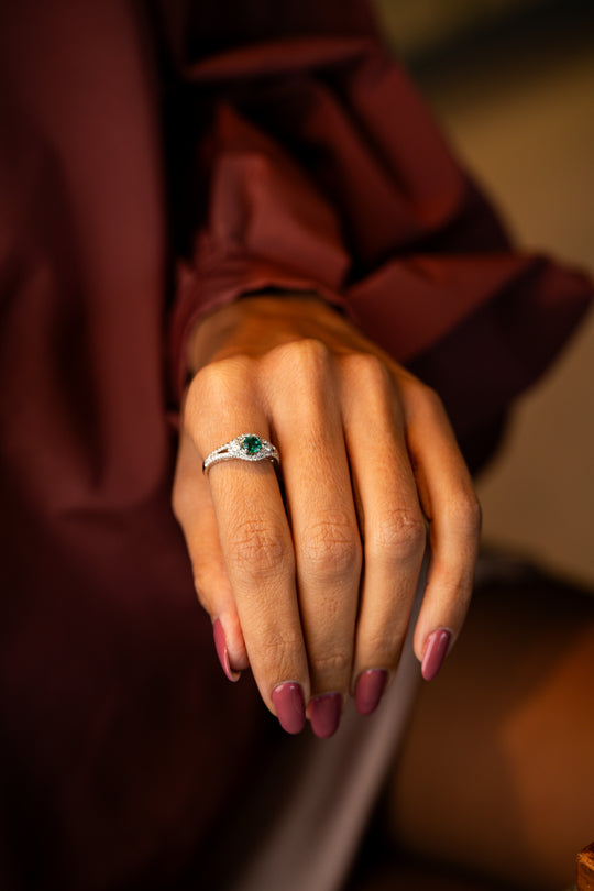 White Gold Engagement Ring with Diamonds and Green Emeralds