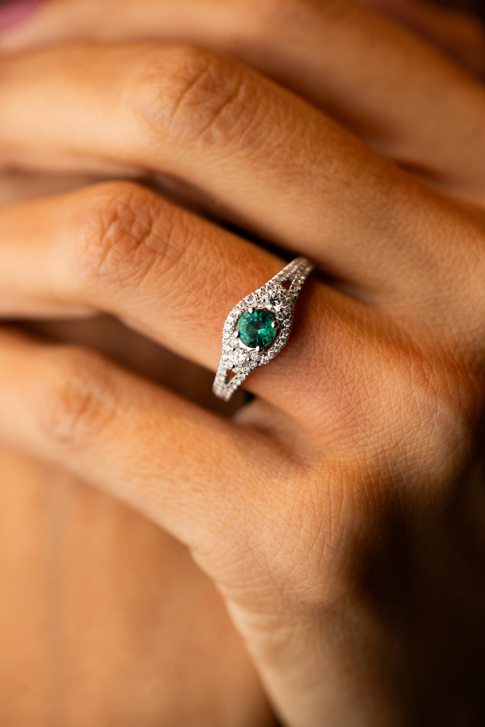 White Gold Engagement Ring with Diamonds and Green Emeralds