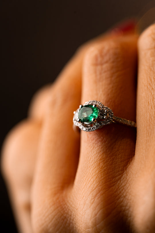 White Gold Engagement Ring with Diamonds and Green Emeralds